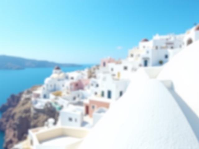 Iconic whitewashed buildings on clifftops overlooking the sea in Santorini